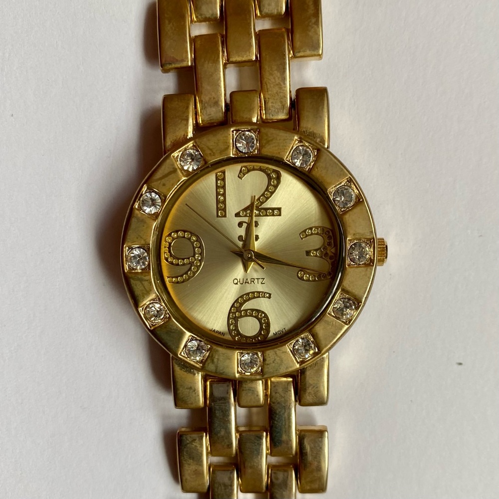 Gold analog watch